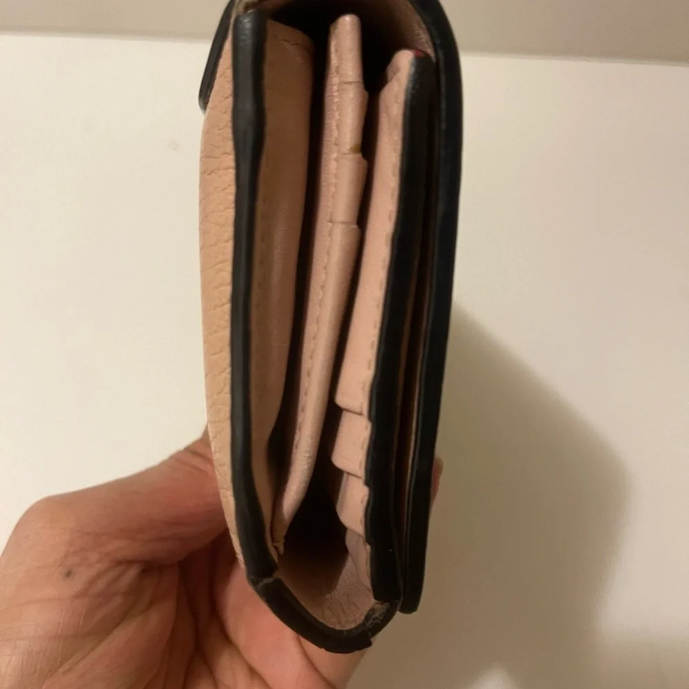 Authentic LANCEL  Italian wallet leather in peach color in good conditions